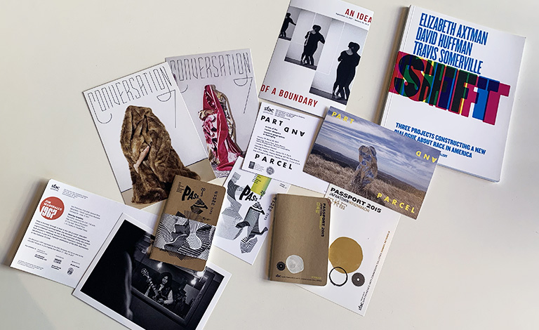 A collection of postcards and publications produced by SFAC Galleries 