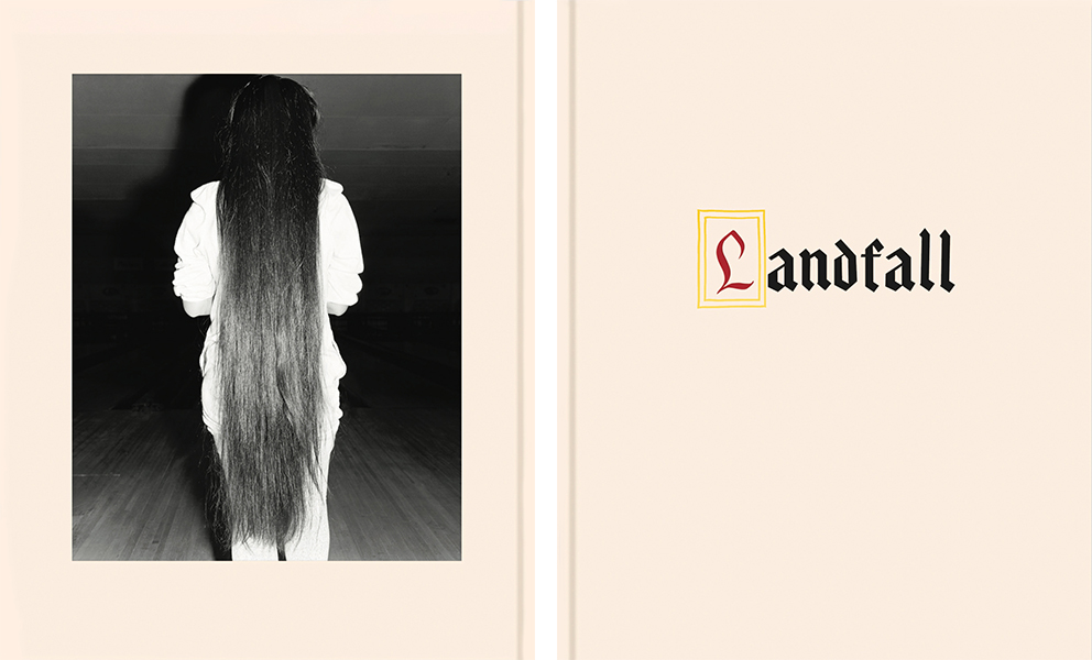 image of  photo book called Landfall with back cover image of the back of a girl with knee length hair