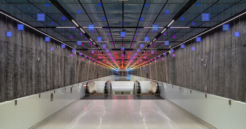 Image of "Lucy in the Sky" central subway station artwork with multicolored led panels.