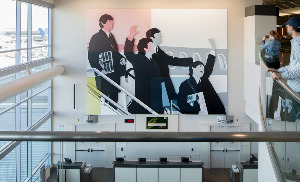 Installation by Kota Ezawa at an airport gate featuring The Beatles coming off a plane overlaid with a composition by Piet Mondrian a famous abstract painter