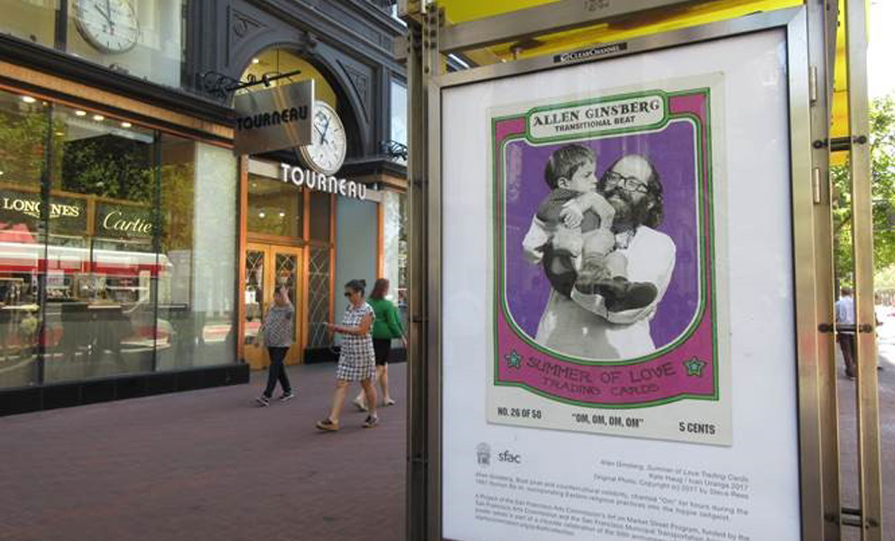 Kiosk poster close up of Allen Ginsburg holding a child